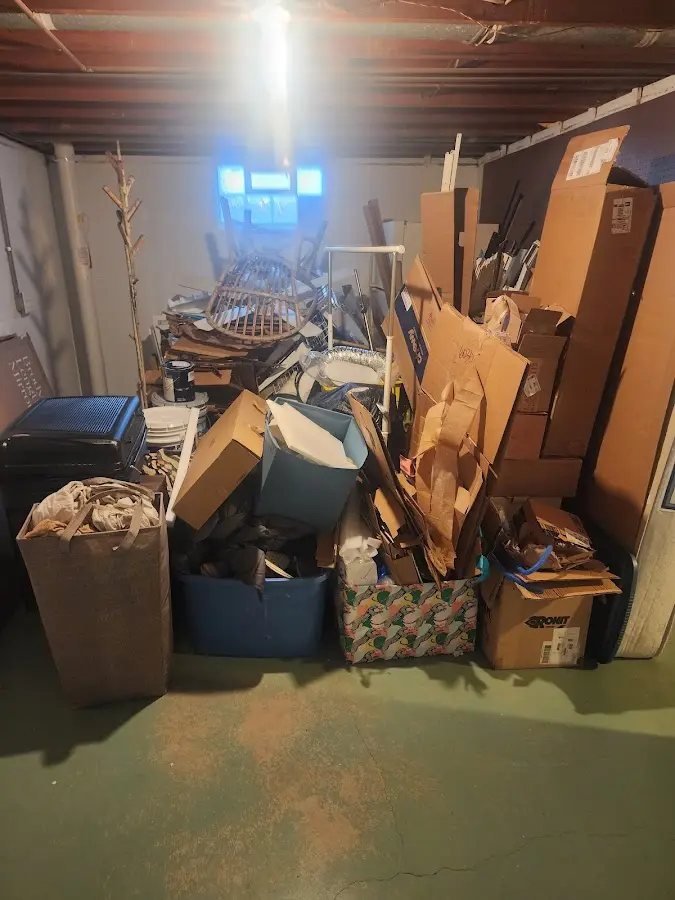 Roll-off dumpster container at job site for 6 Yard Dumpster Rental in Ingram